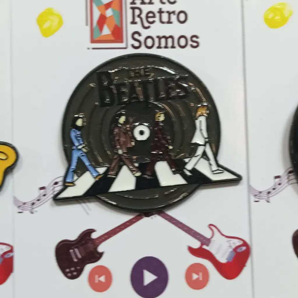 [0012] The Beatles : Abbey Road Vinilo Rojo Pin