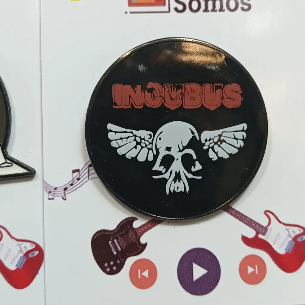 [0033] Incubus : Calavera con Alas Pin
